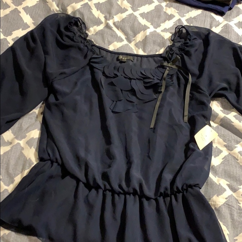 Navy blue blouse with scalloped detail and bow